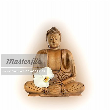 Buddha with aura and eyes closed in prayer with an orchid flower, over white background.