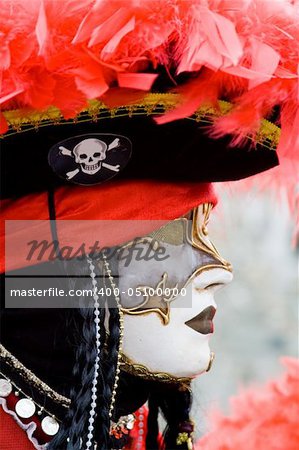 Carnival in venice with model dressed in various costumes and masks - pirate