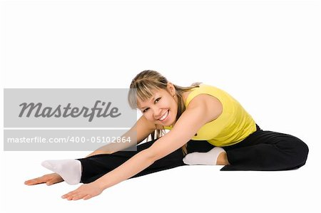 Nice girl stretching. Isolated on white