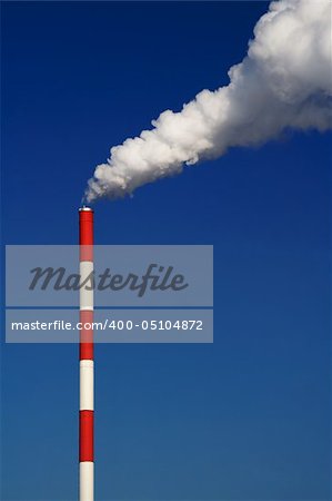 Factory pipe pollutes an environment. Vertical