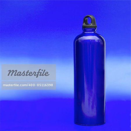 Aluminum water flask on blue background