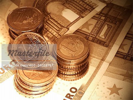 euro coins and notes in sepia tones
