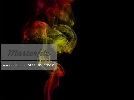 Colored smoke curves isolated on black background