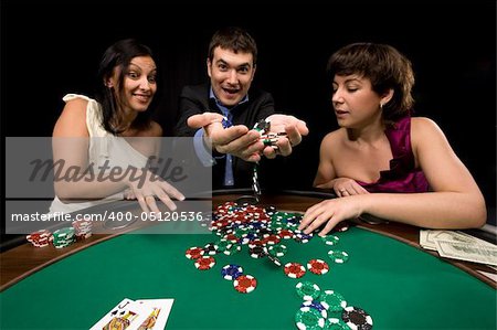 Stylish man wins in the casino over black