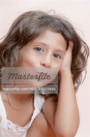 Studio portrait of  nice little girl having good time