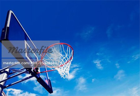 Red New Basket Ball Net Under Beautiful Blue Sky
