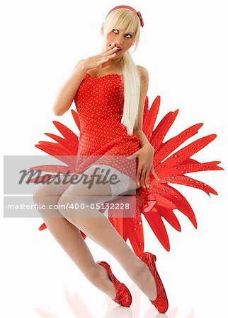pretty blond pin up in red dress and white stockings taking pose