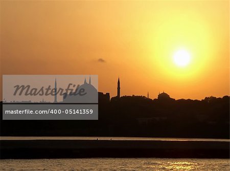 This image shows a mosque in Istanbul with sunset