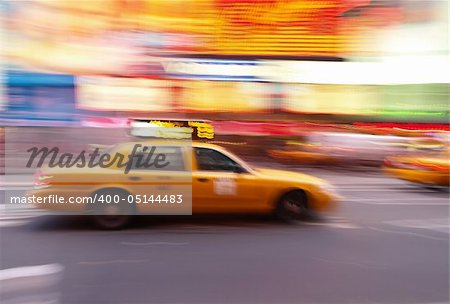 Taxi at times square at night in New York City