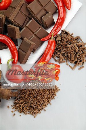 Delicious dark chocolate with a selection of different chilies and peppers.