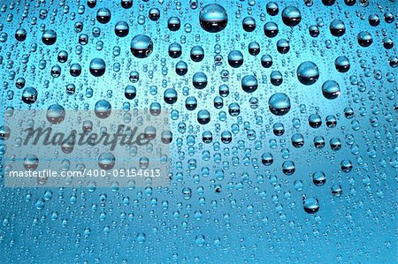 macro of blue water drops and bubbles