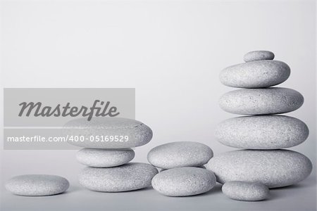 High Key study of white pebbles arranged in stacks