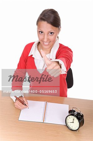 young girl learning at desk. over white background