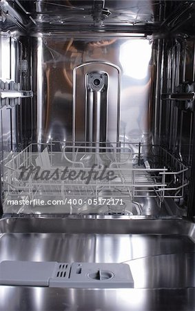 inside of empty and clear dishwasher machine