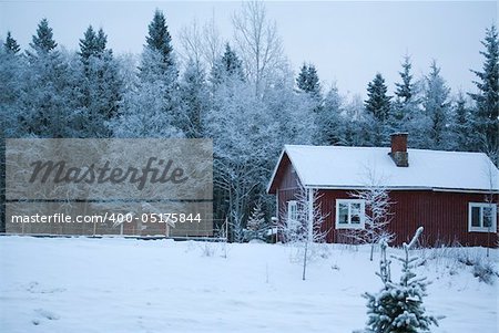 Village winter / Christmas / wooden house under snow / Finland