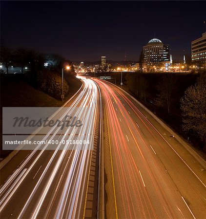 Night view of Interstate 5 in Portland, Oregon with light trails.