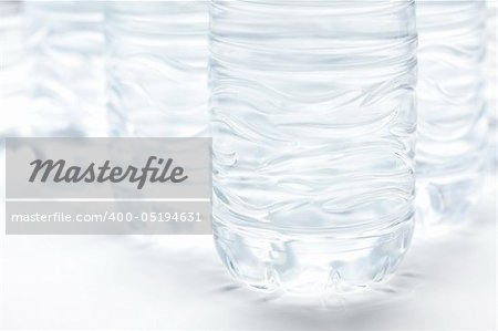 Water Bottles Abstract Image on a Gradated White Background.