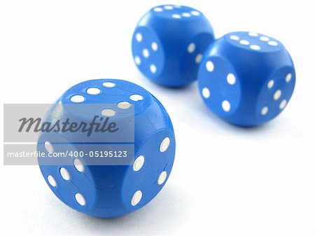 three blue dices with white dots