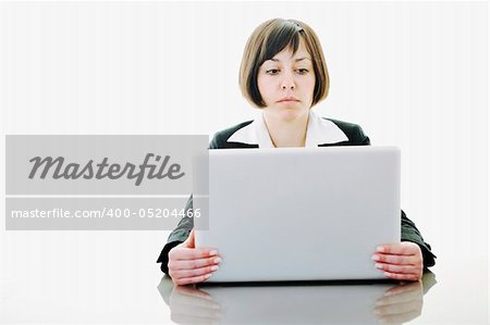 one young business woman isolated on white working on laptop computer