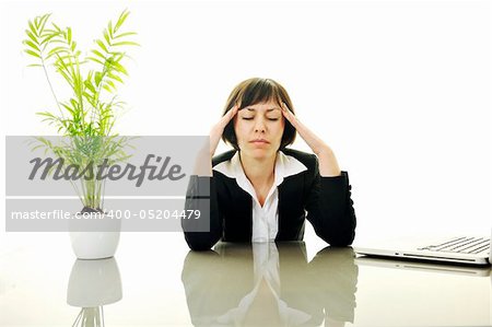 one young business woman isolated on white working on laptop computer