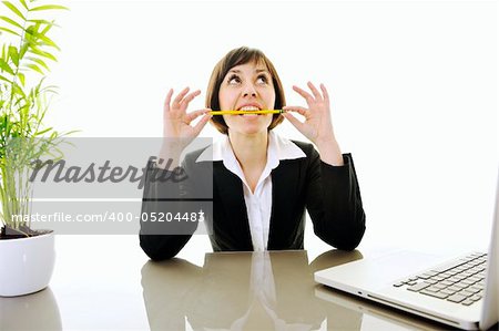 one young business woman isolated on white working on laptop computer