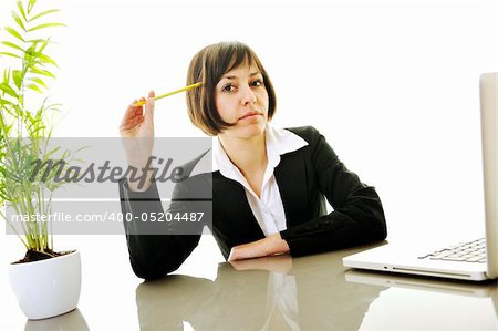 one young business woman isolated on white working on laptop computer