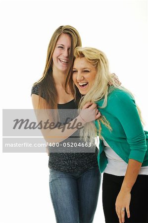 two happy young teenage girl isolated on white