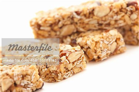 Several Granola Bars Isolated on a White Background with Narrow Depth of Field.