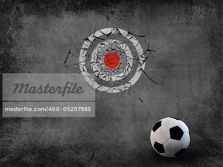 Dark gray wall grunge with soccer ball hit the target