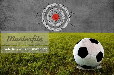 Soccer ball on penalty disk for shooting target training