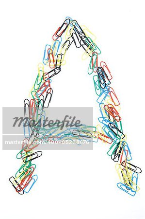 Letter A formed with colorful paperclips