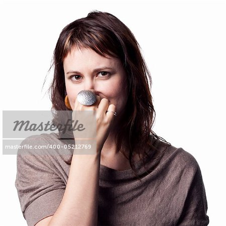 A bad smell makes this lady cover her nose