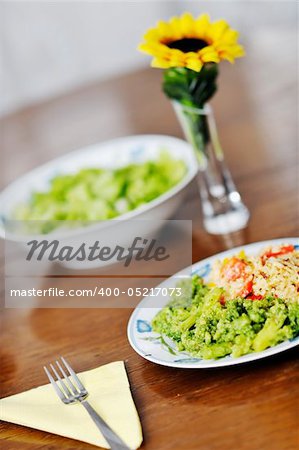 healthy vegetarian vegetables and rice food in dish at kitchen