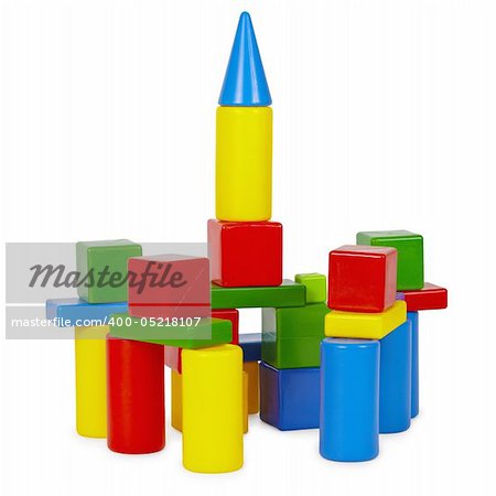 Tower of toy bricks on a white background