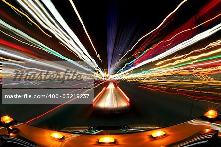 Abstract Image of Driving at Night With City Lights and Traffic