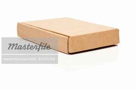 Closed Thin Cardboard Box Isolated on a White Background.