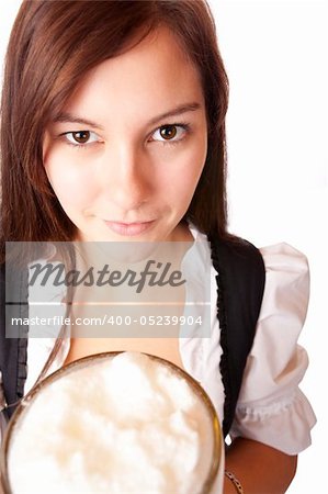 /Closeup of a Beautiful woman holding Oktoberfest beer stein. Isolated on white.