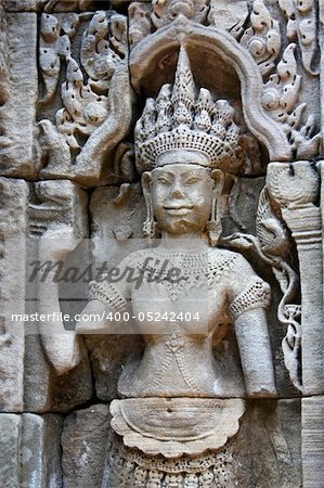 Apsara - one of thousands of unique carvings of khmer dancing girls in Angkor Wat, Cambodia