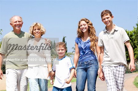 portrait of a happy family standing outdoor