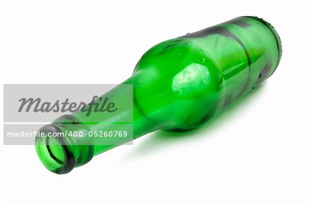 A beer bottle covered with water drops isolated on white