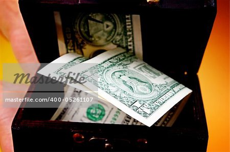 Wood cashbox isolated on yellow