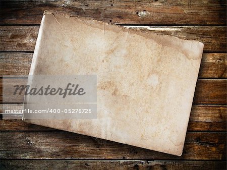 Old paper on panel wood background Horizontal