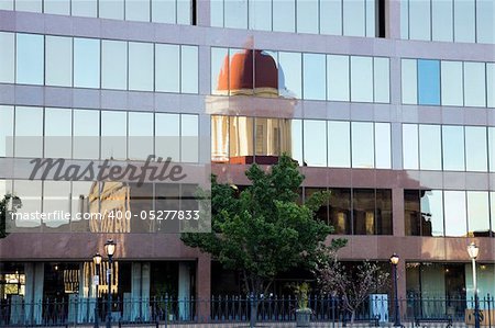 Architecture of Springfield - Old Capitol Building reflected in modern skyscraper