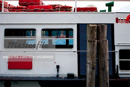 ferry with piles for mooring and buoys