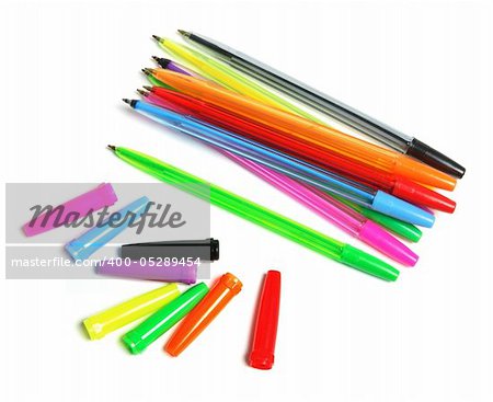 Ball Pens and Caps on White Background