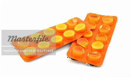 Pills on white background