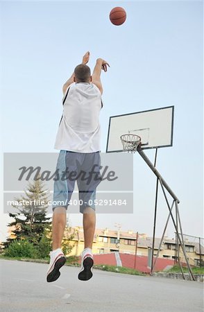 basketball player practicing and posing for basketball and sports athlete concept