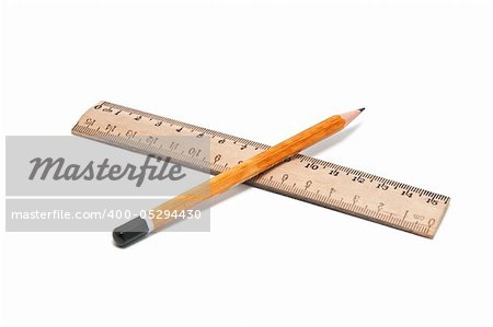 Ruler and pencil on a white background