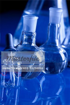 Laboratory Glassware in blue table in laboratory