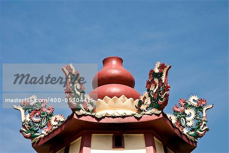 Golden dragon statue on the roof